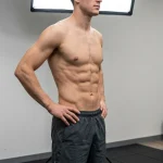 Why Does My Stomach Fat Look Like Abs? The Science of Pseudo-Abs 2 Athletic fitness physique demonstrating abdominal contours and tendinous intersections (AI Generated Image)